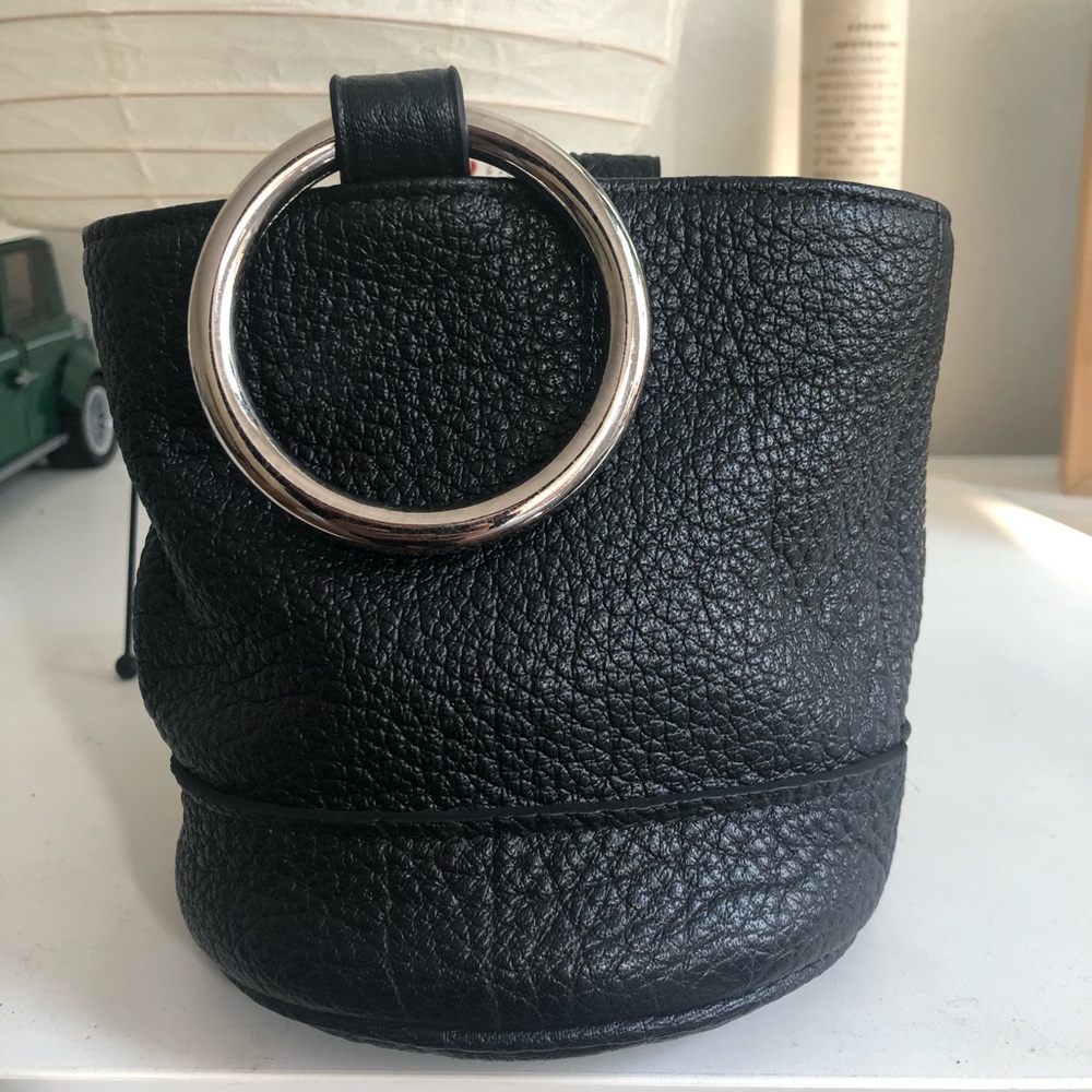 Simon Miller black mini bonsai bag.